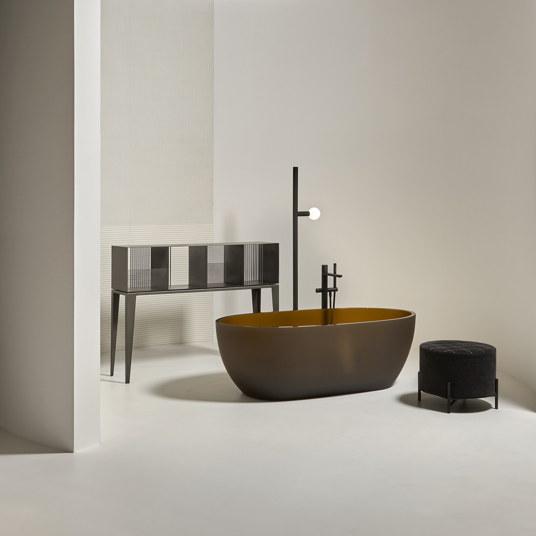 the play of solids and voids, of lights and shadows, inside and out, of content and container